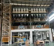 نظام مجمع الغبار الناتج عن الملاط الجاف ولاصق البلاط ومعجون الجدران (لإعادة الاستخدام في خط الإنتاج) 